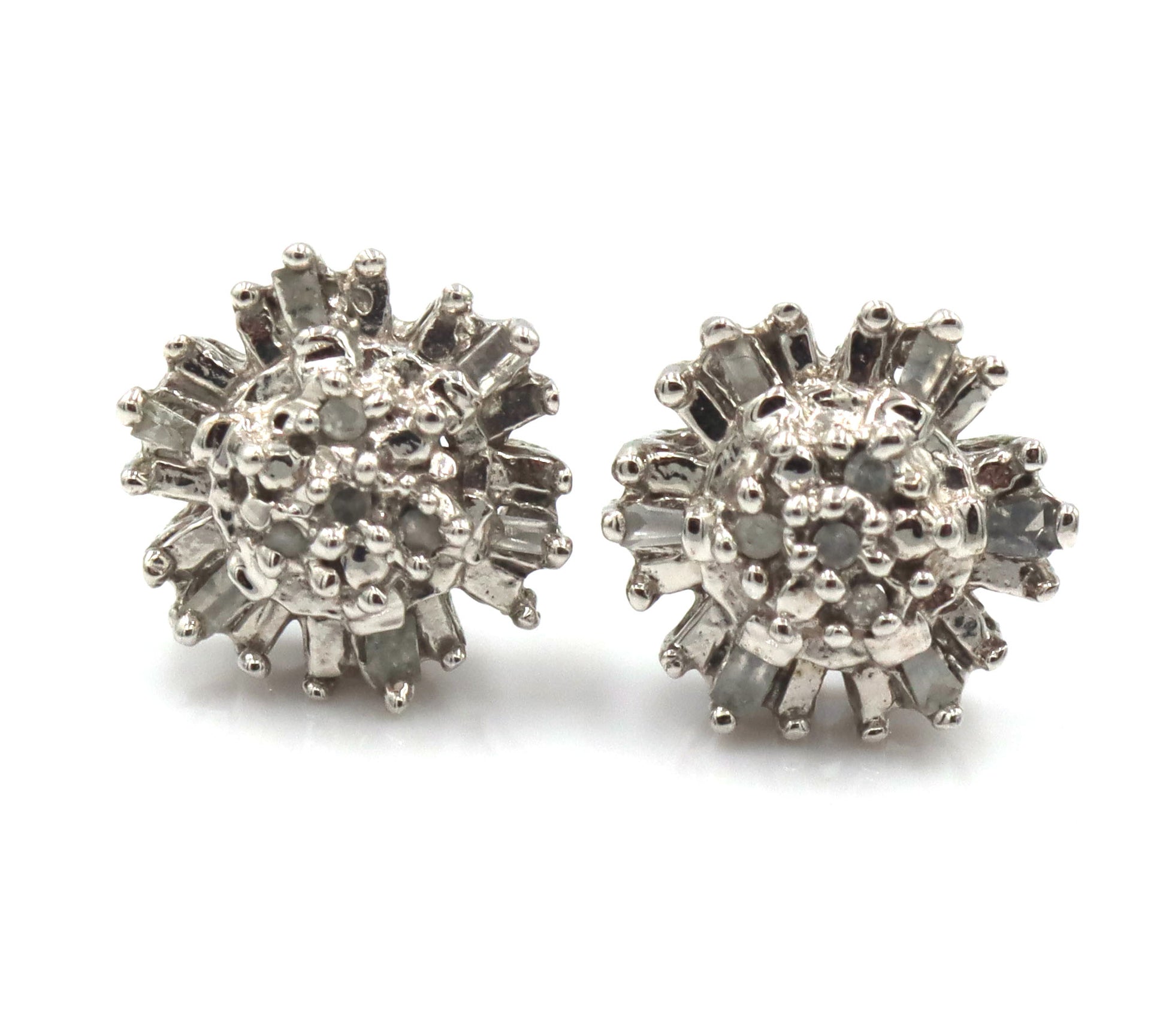 10kt White gold diamond flower style stud earrings
